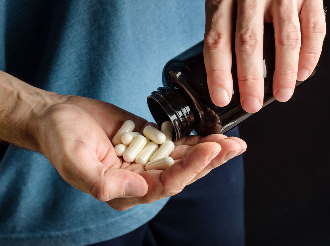 taurine - man with capsules