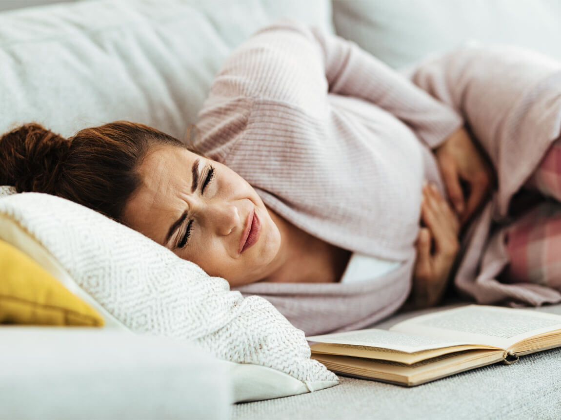 žena - Bolest břicha