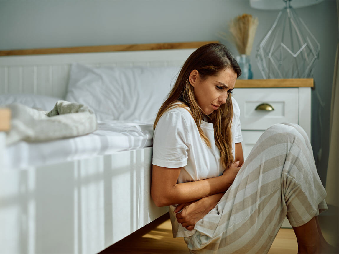 žena - bolest břicha